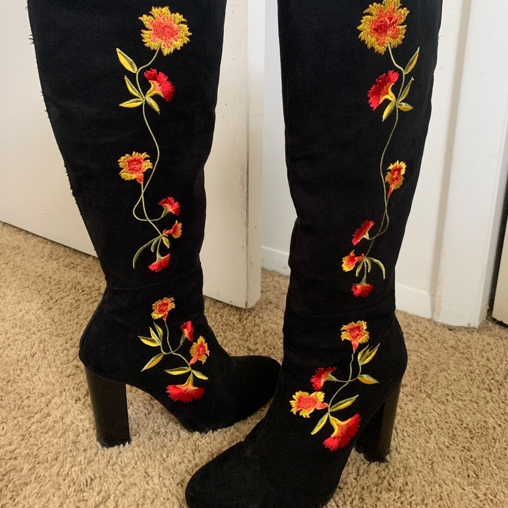“Intentionally blank” tall flower boots